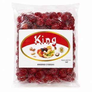 Добірні ягоди натуральної в'яленої вишні King рубінового кольору в упаковці.