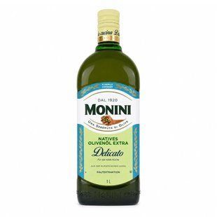 Натуральна італійська оливкова олія першого холодного віджиму Monini Delicato з м'яким смаком у пляшці з темного скла об'ємом 1 л.